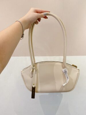 Bolsinha bege baguete C&A