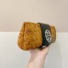 Clutch vime Tory Burch