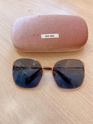 Óculos quadrado Miu Miu